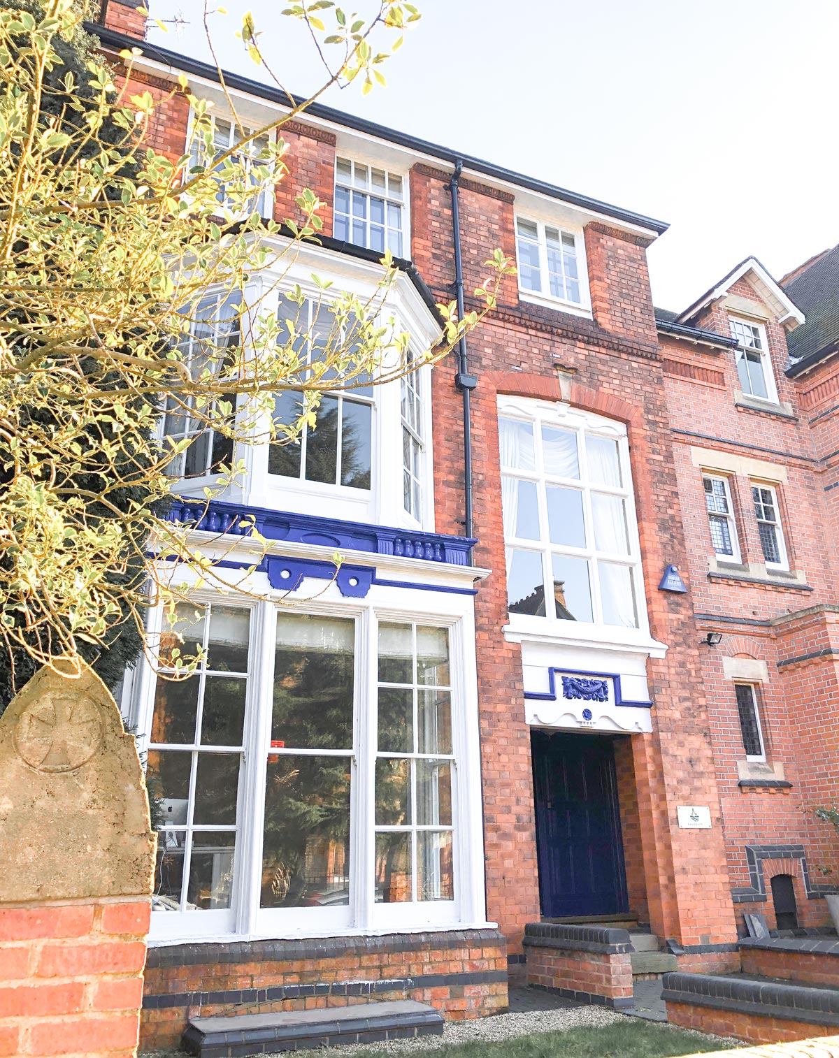 Photograph taken outside 10 Salisbury Road showing the front of the building on a sunny day